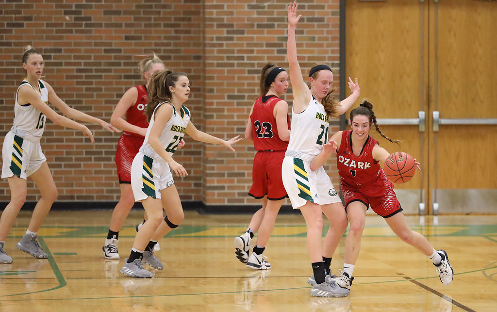 Ozark's Riley Boggs drives to the basket